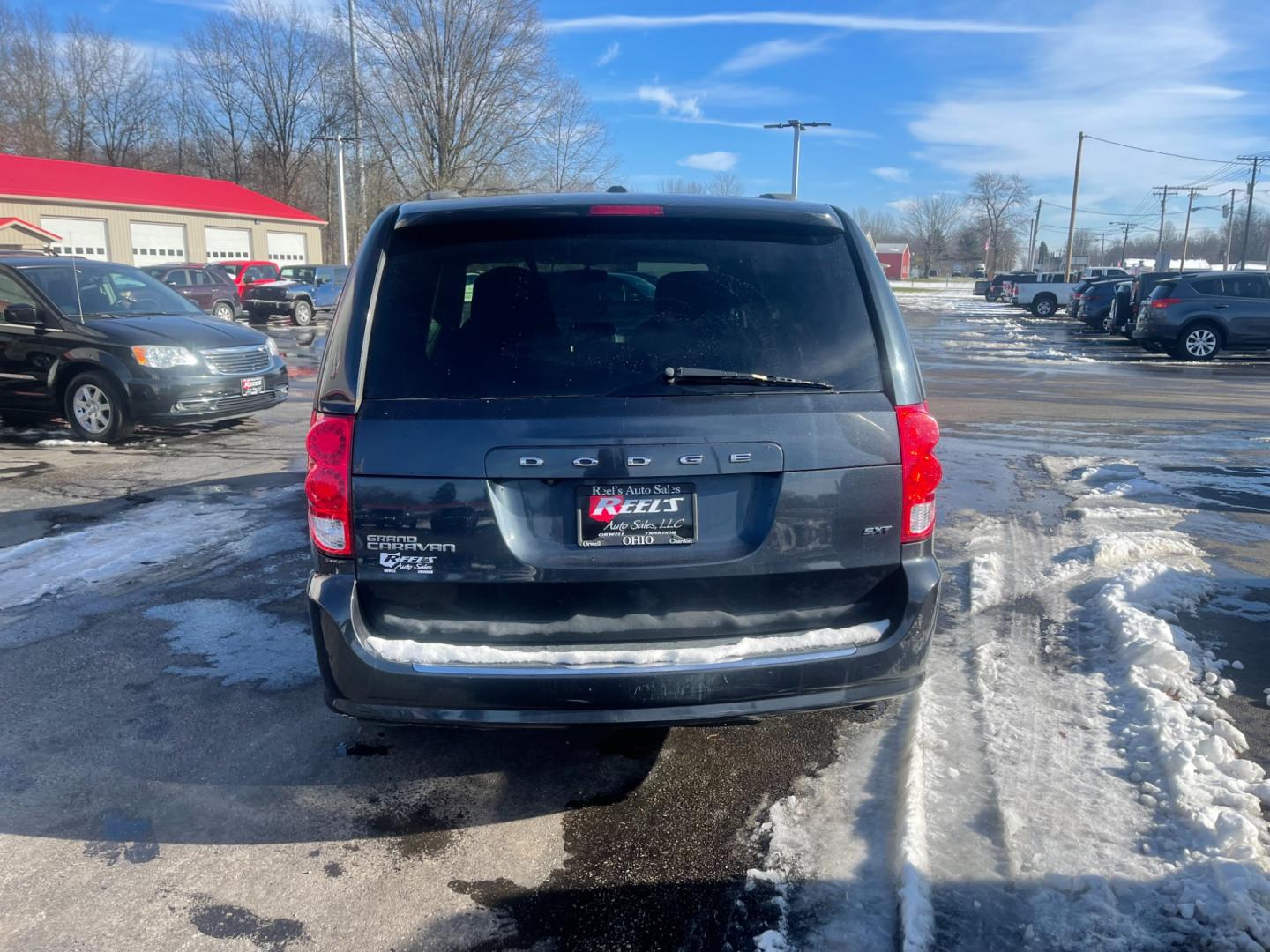 2014 Gray /Black Dodge Grand Caravan SXT (2C4RDGCG9ER) with an 3.6L V6 DOHC 24V FFV engine, 6 Speed Automatic transmission, located at 547 E. Main St., Orwell, OH, 44076, (440) 437-5893, 41.535435, -80.847855 - This 2014 Dodge Grand Caravan SXT is equipped with a rear entertainment system and STOW N GO seating, allowing for easy storage and flexibility. It also features a back-up camera, providing added convenience and safety when parking or reversing. With its versatile seating and entertainment options, - Photo#8